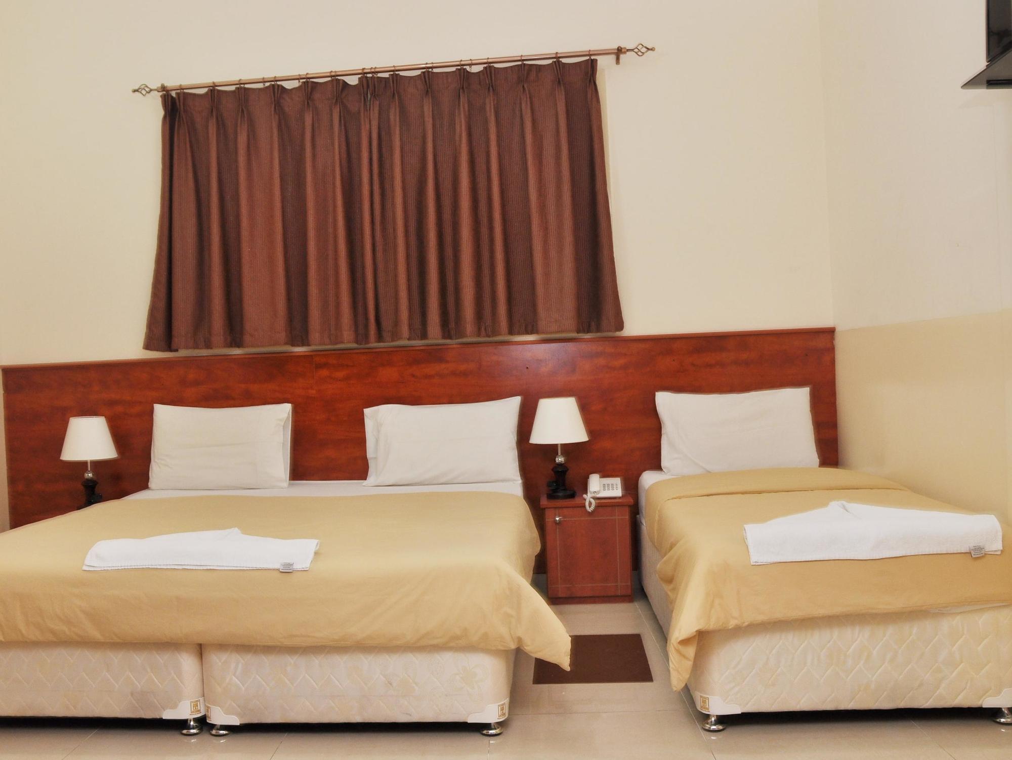 Africana Hotel Dubai Buitenkant foto